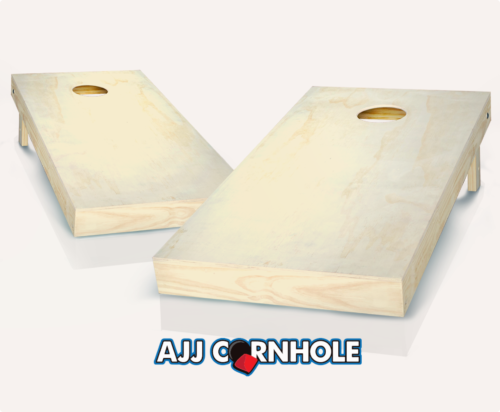 Pair of wooden Cornhole boards regulation size featuring Wyoming Cowboys style swoosh design with folding legs and bean bags on grass.