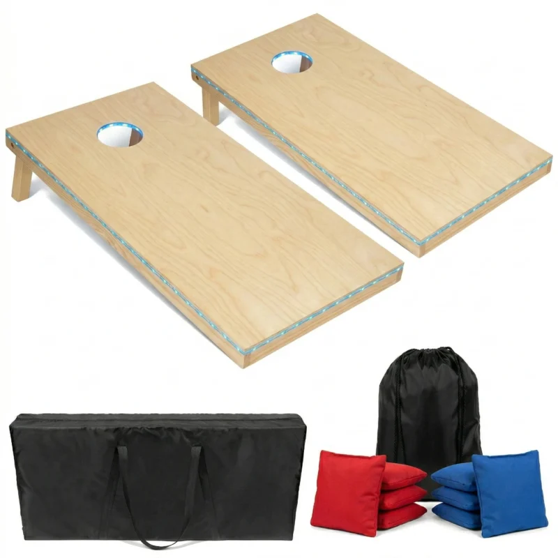 Regulation 4x2 cornhole set with LED lights illuminated in dark setting, featuring custom direct print design and double-stitched bean bags.