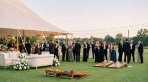 Premium wedding venue blog hero with custom cornhole board
